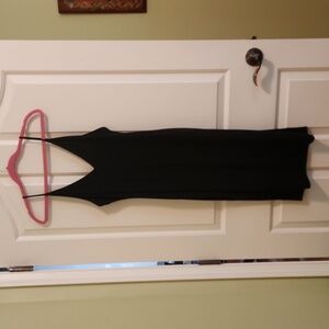 Slinky little black dress size, new never worn Large